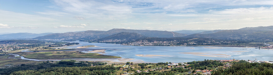 Obraz premium Mouth of the Miño river from Ancient Celtic Village In Santa Tecla. Pontevedra. Tourism in Galicia. The most beautiful spots in Spain.