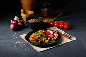 Buckwheat groats baked in the oven with beef goulash