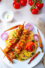 Shish kebabs with vegetables and bulgur