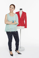 Woman with arms crossed, smiling