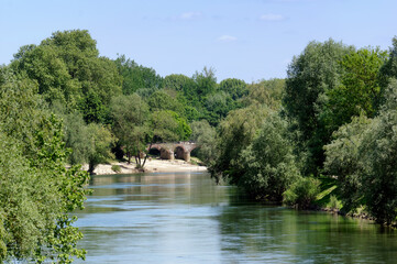 Fototapeta na wymiar Old water mill of Noisiel and Marne river bank