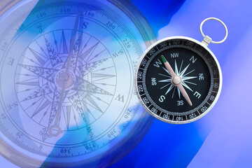 Fototapeta na wymiar round compass on abstract background as symbol of tourism with compass, travel with compass and outdoor activities with compass
