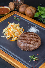 Classic grilled beef steak served with vegetables