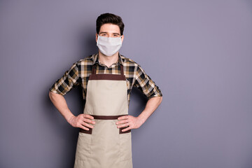 Portrait of his he attractive content healthy guy workman wearing safety mask stop infection flu flue grippe influenza contamination disease sickness illness isolated grey color background