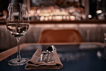 evening in a restaurant, blurred abstract background, bokeh, alcohol concept, wine glasses in a bar
