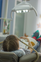 6 years old girl at the dental office with sedation dentistry.