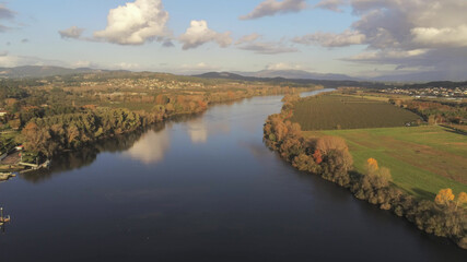 Beautiful river at sunset during Autumn season in Spain