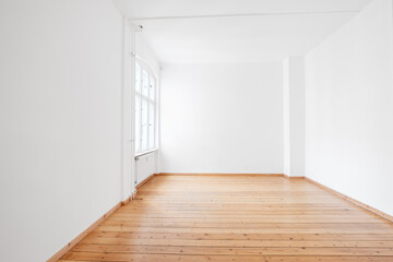 empty white room in apartment flat  with wooden floor