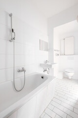 tiled, white bathroom, modern bath with bathtub