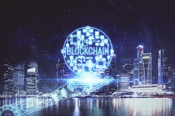 Multi exposure of cryptocurrency theme hologram drawing and city veiw background. Concept of...