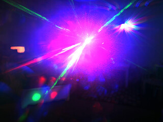 Fototapeta na wymiar Disco abstract lights in colors.