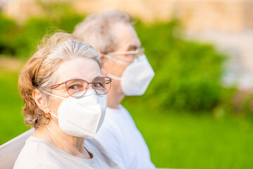 Portrait of a senior couple wearing protective masks during the coronavirus epidemic