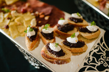 Catering served on a plate in the restaurant. Delicious snack