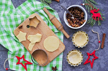 Step-by-step cooking of mince pies  traditional British Christmas shortcrust pastry cakes stuffed with dried fruits, nuts and apples.