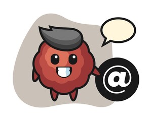 Meatball cartoon standing beside the At symbol