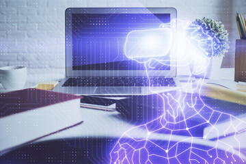 Naklejka premium Computer on desktop with AR theme icon. Multi exposure. Concept of augmented reality.