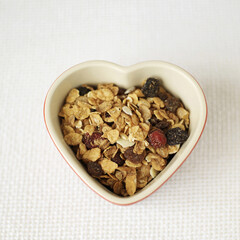 Muesli in heart bowl