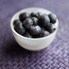 Close up of some blueberries in a bowl