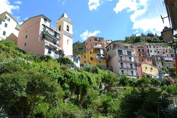 Fototapeta na wymiar MANAROLA, ITALY – AUGUST 20, 2013: A view of Manarola, one of the Five Villages, in the Region of Liguria, Italy