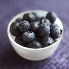 Close up of some blueberries in a bowl
