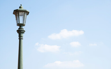 Fototapeta na wymiar classic street lamp, sky and clouds - copy space
