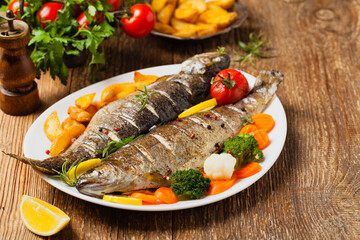 Grilled whole trout. Served with baked potatoes.
