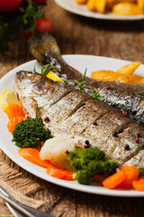 Grilled whole trout. Served with baked potatoes.
