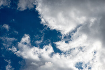 Fototapeta premium Clouds at sunset. Clouds. Cumulus sunset clouds with sun setting down.