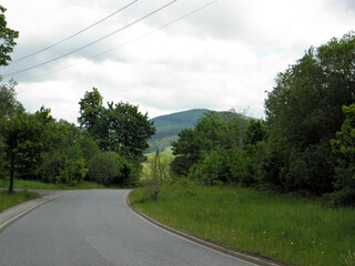 Fototapeta na wymiar Droga w górach z górskim krajobrazem.