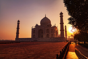 Naklejka premium A beautiful view of the Taj Mahal seen in the golden light during Sunrise