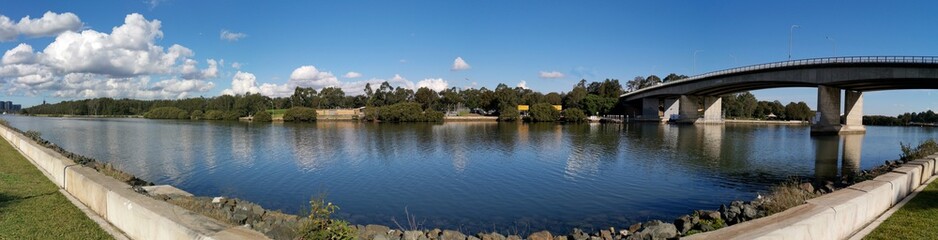 Naklejka premium Beautiful sunny day panoramic view of Parramatta river and bridge near Ermington, New South Wales, Australia