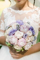 the bride's bouquet, wedding day, bride holds a bouquet, purple bouquet, bouquet of peonies, wedding day