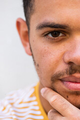 Obraz premium half frame portrait thinking young african american man