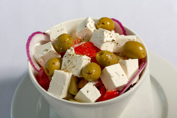 Greek salad with feta cheese in a bowl