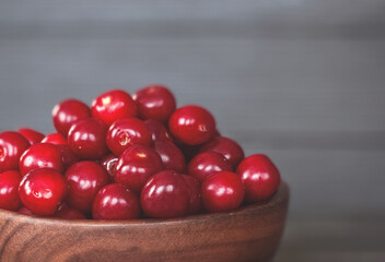 ripe fresh cherries in a macro bowl. background with ripe cherries.
