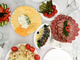 Dishes and fish salads on the festive table