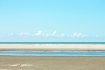 Fototapeta na wymiar Beautiful ocean landscape with clouds in blue tones. Summer dream concept