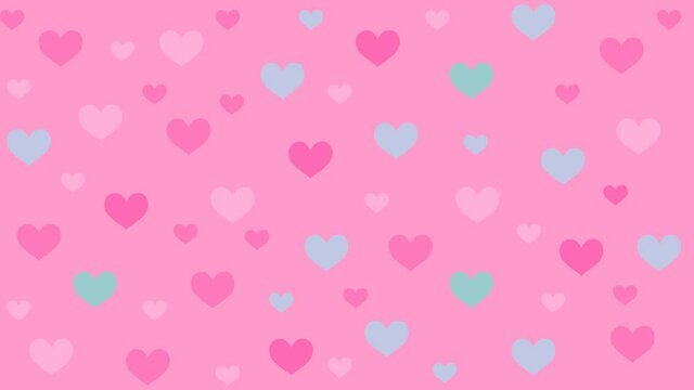 Animation, on a pink background, the movement of the symbol of the heart in different colors.