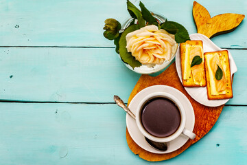 Healthy breakfast. Cup of coffee (black tea), milk, crackers with butter and salmon