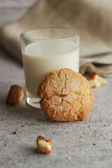 Tasty almond cookies with milk. Cookies on a plate