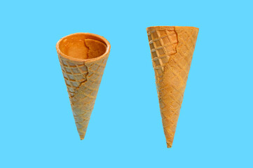 two angle views of empty ice cream cone on a blue background