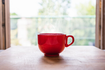 Cup of coffee on a wooden table