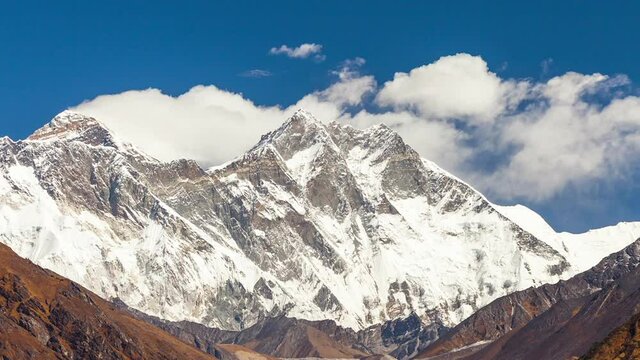 Clouds at Snow line of Annapurna Mountains view from Poon Hill Snow Covered Timelapse Nepal.