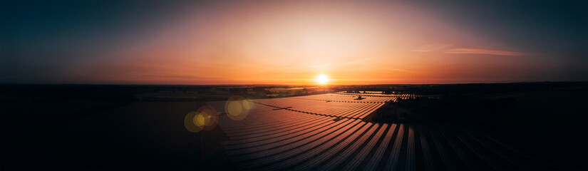 Panoramic aerial over a modern solar farm