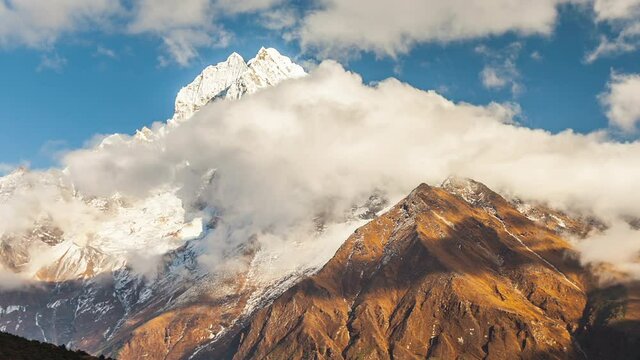 Clouds at Snow line of Annapurna Mountains view from Poon Hill Snow Covered Timelapse Nepal.