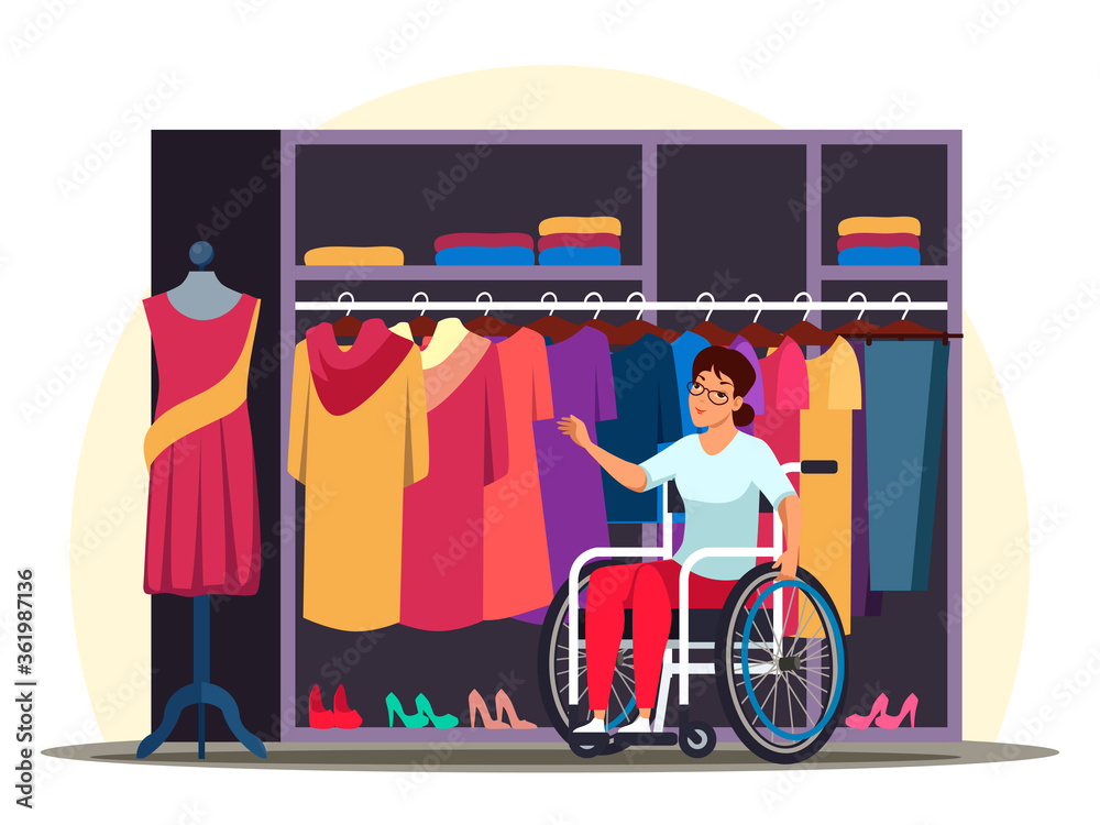 Wall mural Disabled woman in wheelchair shopping, buys clothes in store