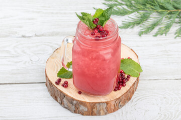 Cranberry and ice lemonade in a glass, transparent glass