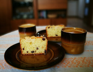 Yeast cake with crumble and raisins. And a cup of tasty coffee.