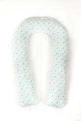 Maternity pillow model sleeping in bed