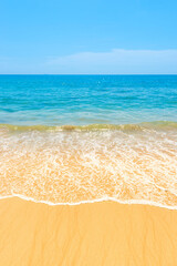 Blue sea blue water and sand beach with blue sky as summer holiday vacation background